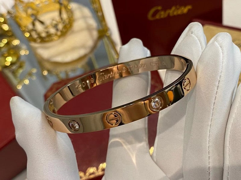 Side view of Cartier unisex jewelry piece