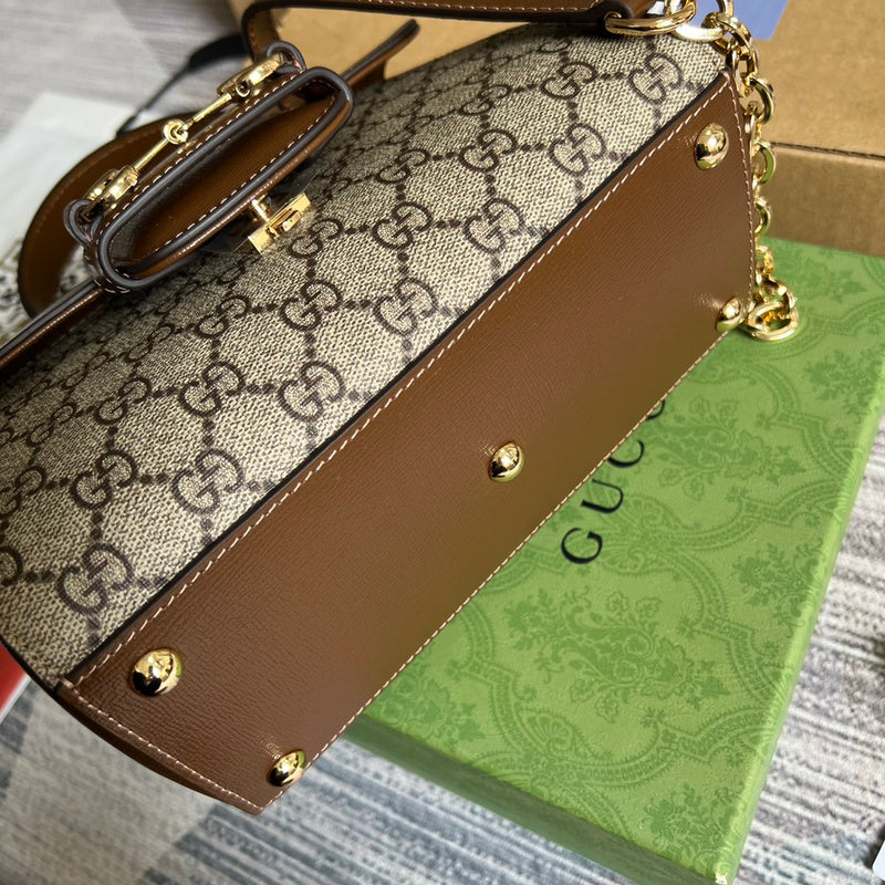 Handle and strap detail of premium statement women's handbag – women's premium purse