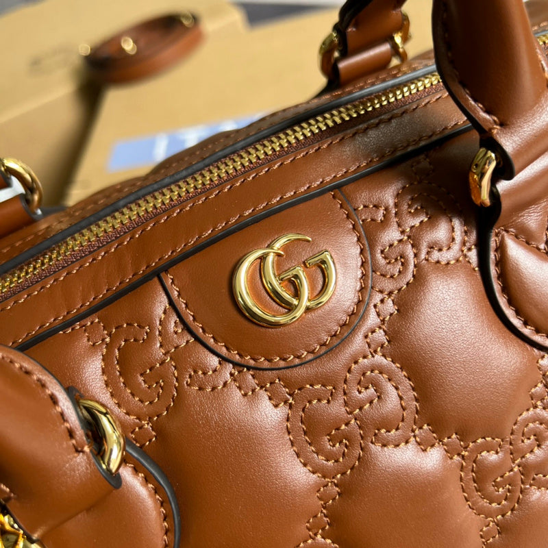 Styled lifestyle shot of statement refined women's handbag – women's statement bag