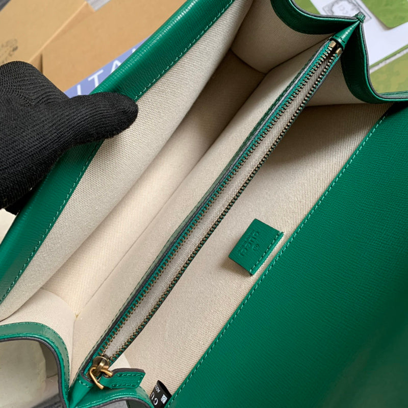 Top view of classic statement women's handbag – women's designer-style accessory