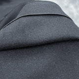 Back view of Louis Vuitton luxury clothing with everyday silhouette