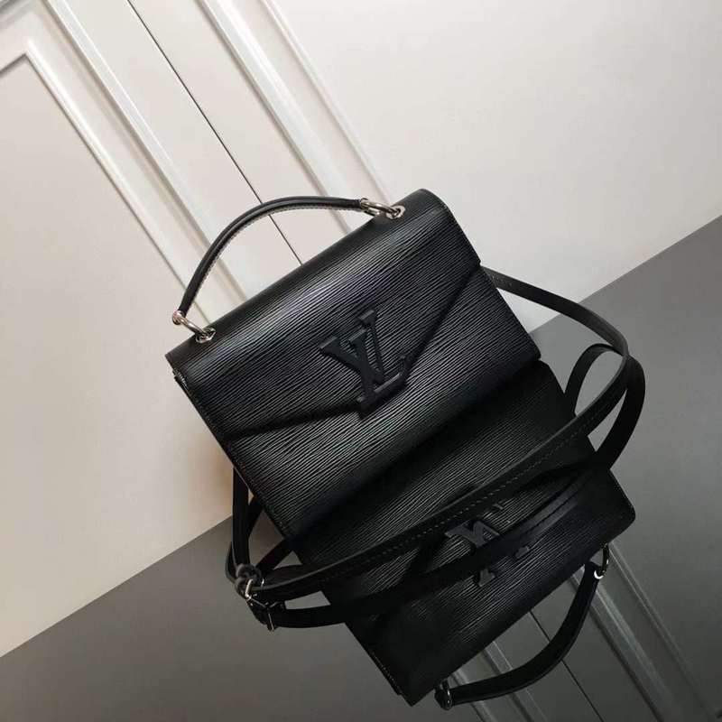 Styled lifestyle shot of everyday-luxe structured women's handbag – women's statement bag