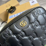 Back view of statement sleek women's handbag – women's luxury accessory