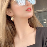 Front view of Louis Vuitton unisex sunglasses