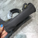 Structured Vegan Leather Handbag - Polished Finish | Women's Everyday Carry Handbag #685 - styled full view (image 7) of designer-inspired handbag