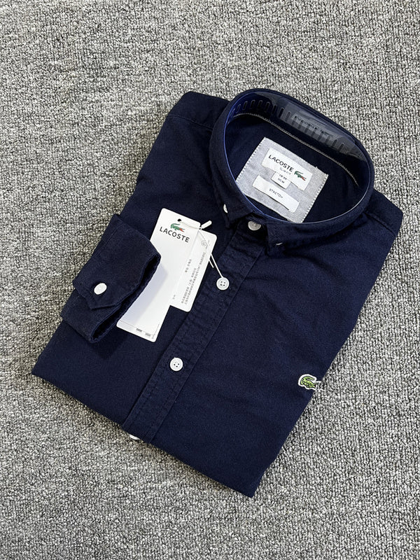 Close-up detail shot of Lacoste luxury clothing with logo-detail design