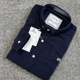 Close-up detail shot of Lacoste luxury clothing with logo-detail design