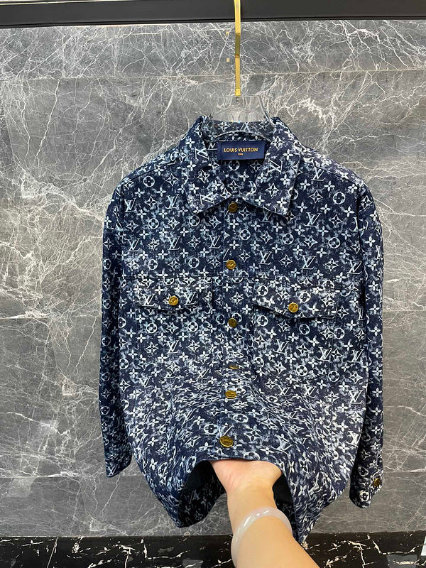 Flat lay presentation of Louis Vuitton luxury clothing with logo-detail design