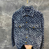 Flat lay presentation of Louis Vuitton luxury clothing with logo-detail design