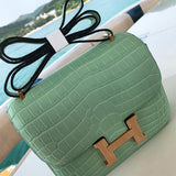 Side view of timeless structured handbag