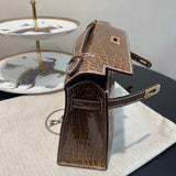 Side view of sleek structured handbag