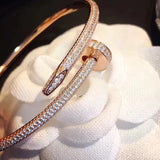 Close-up detail view of Cartier unisex jewelry piece