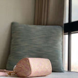 Styled lifestyle shot of chic everyday-luxe women's handbag – women's luxury accessory