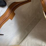 Close-up detail of signature statement women's handbag – women's premium purse