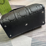 Side profile of elevated refined women's handbag – women's luxury accessory