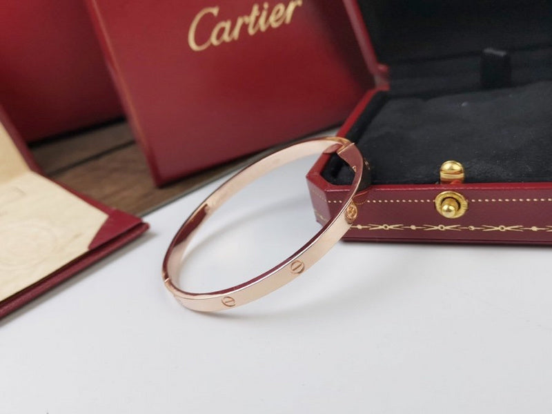 Angled view of Cartier unisex jewelry piece