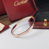 Angled view of Cartier unisex jewelry piece