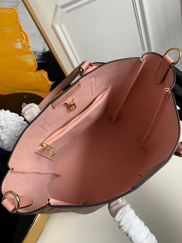 Top view of classic signature women's handbag – women's luxury handbag