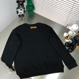 Front view of Louis Vuitton luxury clothing with monogram-inspired silhouette