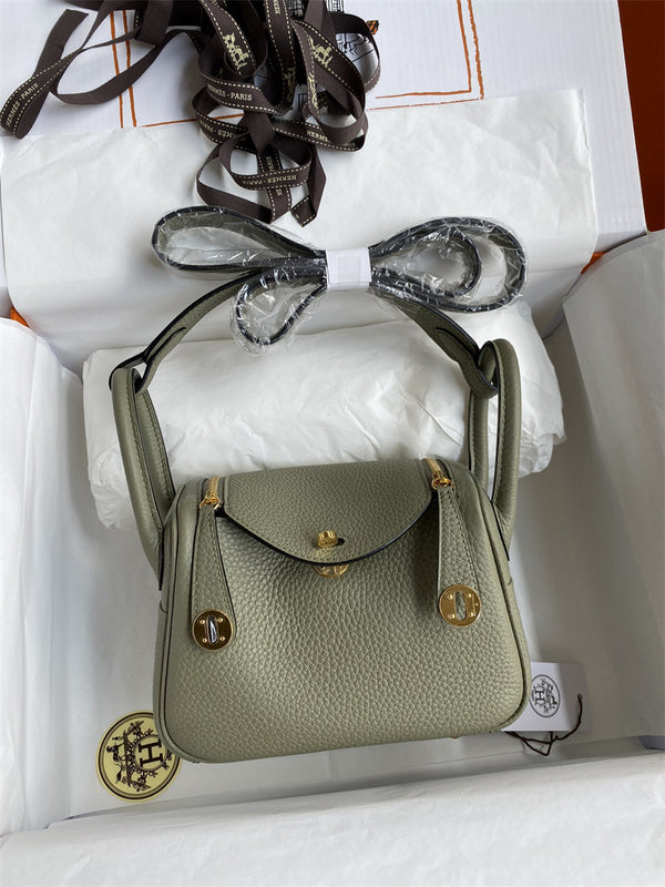 Side view of polished structured handbag