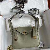 Side view of polished structured handbag