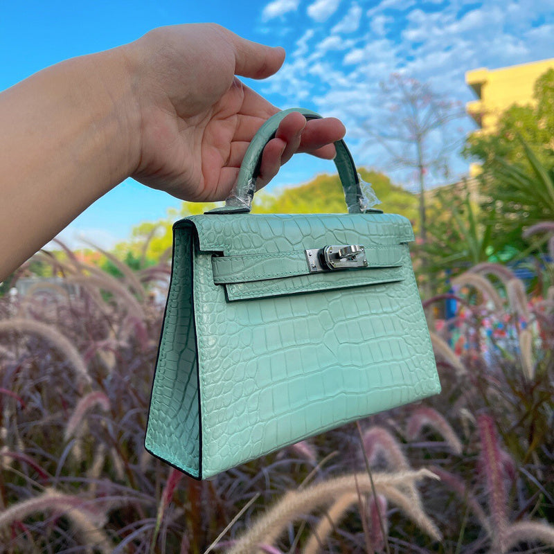 Side view of refined structured handbag