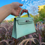 Side view of refined structured handbag