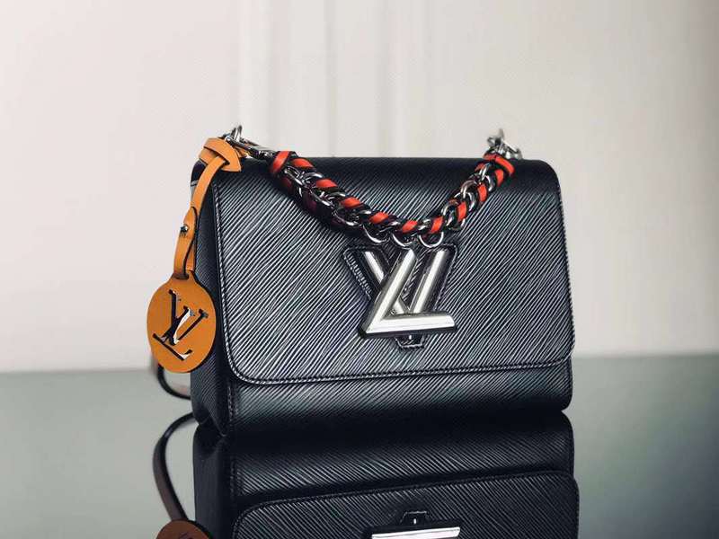 Front view of structured classic women's handbag – women's luxury handbag