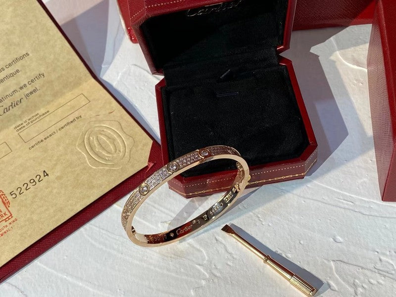 Side view of Cartier unisex jewelry piece