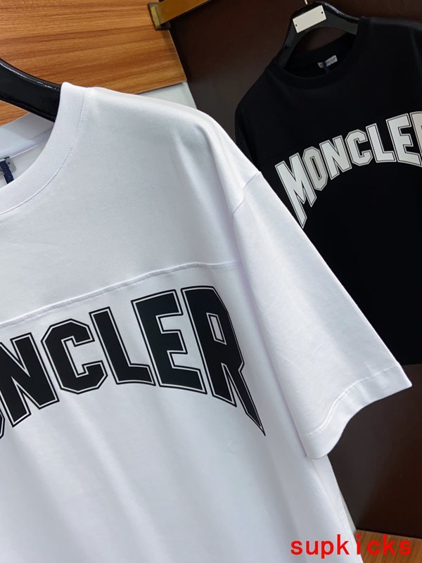 Close-up detail shot of Moncler luxury clothing with contemporary cut