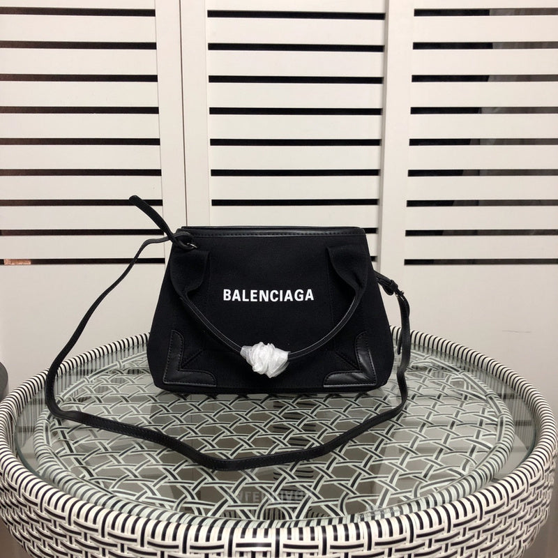 Side profile of statement refined women's handbag – women's premium purse