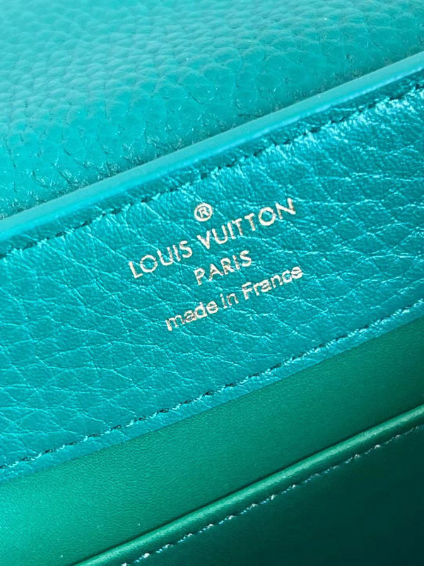 Side profile of refined chic women's handbag – women's luxury handbag