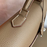 Poised bag shown from front angle