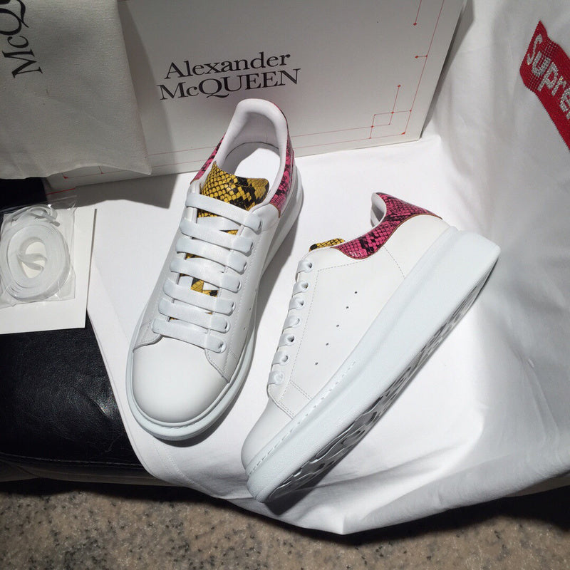 Alexander McQueen fresh white-and-black luxury sneakers view 10 signature lace-up style