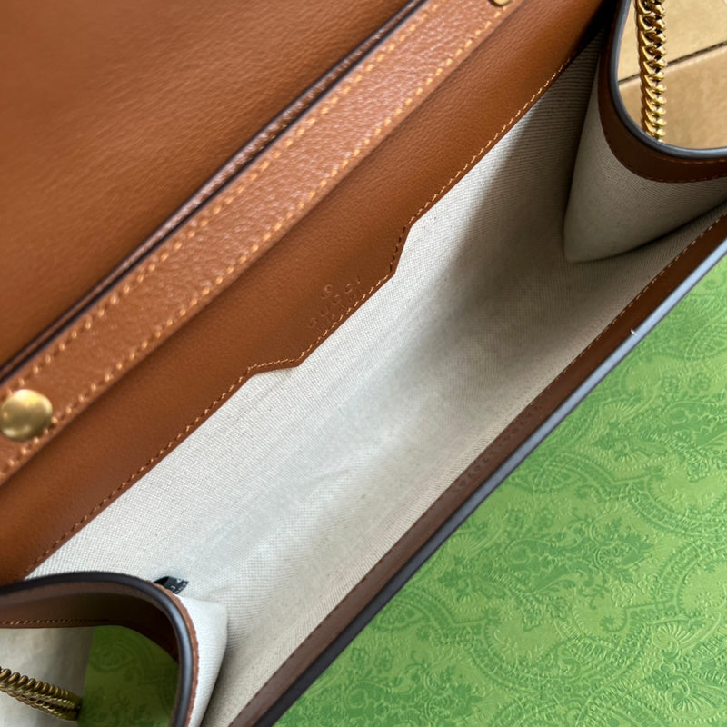 Side profile of everyday-luxe structured women's handbag – women's luxury accessory