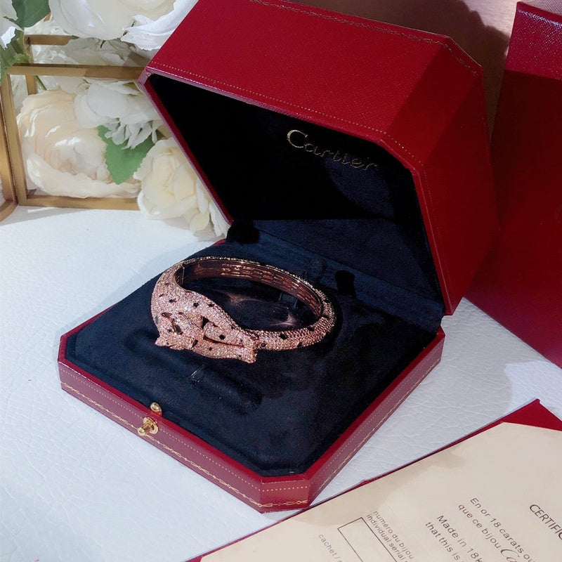 Close-up detail view of Cartier unisex jewelry piece