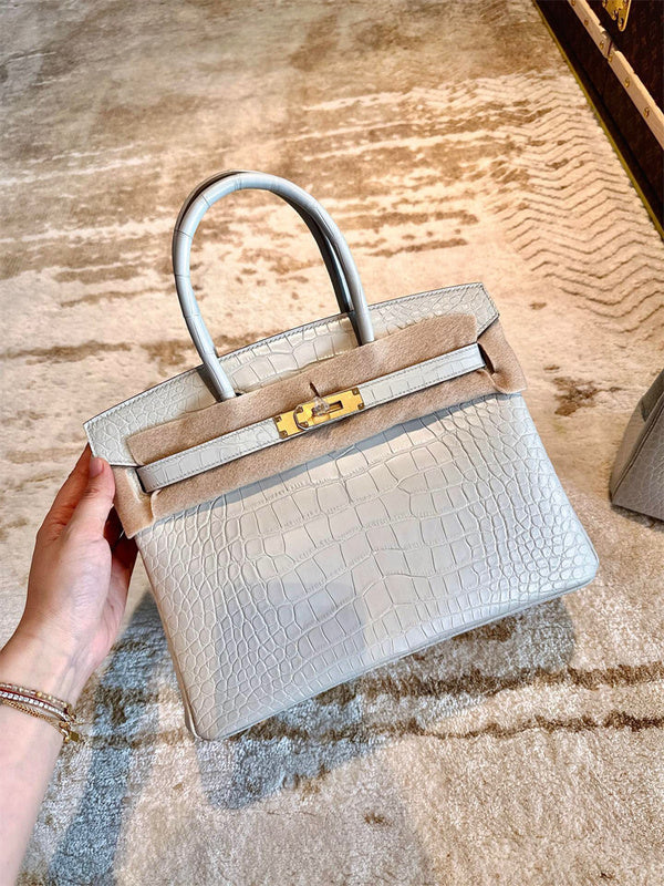  Signature everyday bag carried on shoulder