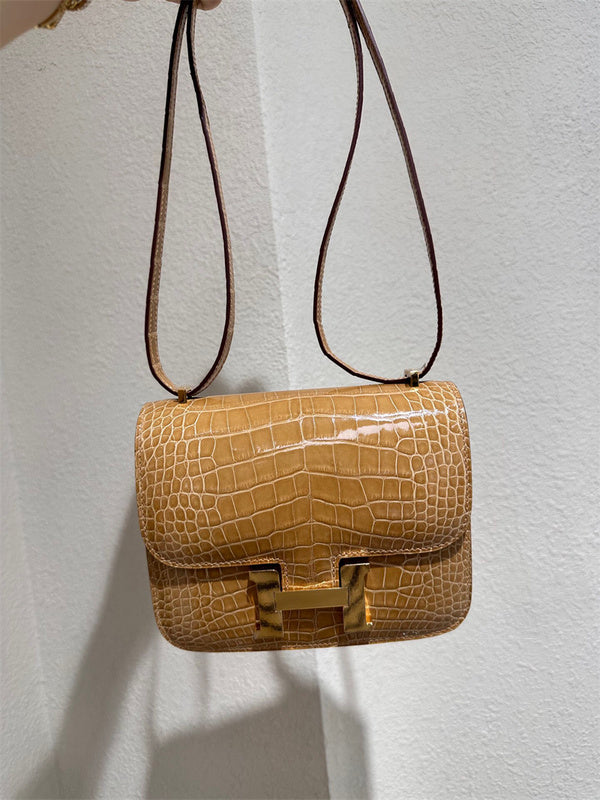  Understated structured bag carried on shoulder 22