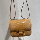  Understated structured bag carried on shoulder 22