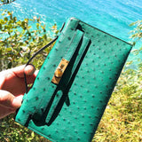 Side view of sculpted structured handbag