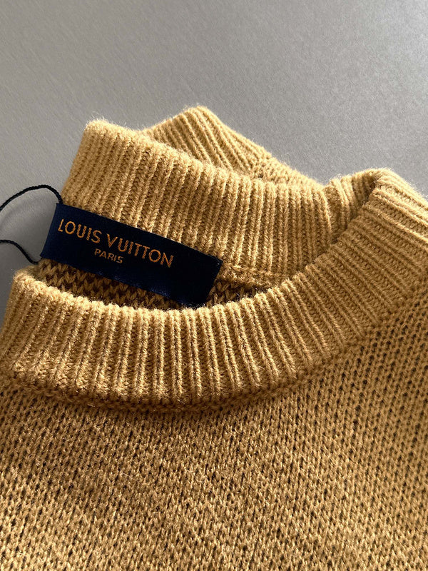 Front view of Louis Vuitton luxury clothing with signature branding