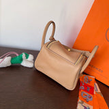 Side view of curated structured handbag