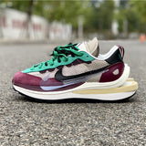 Side profile of Nike two-tone sneakers breathable knit upper