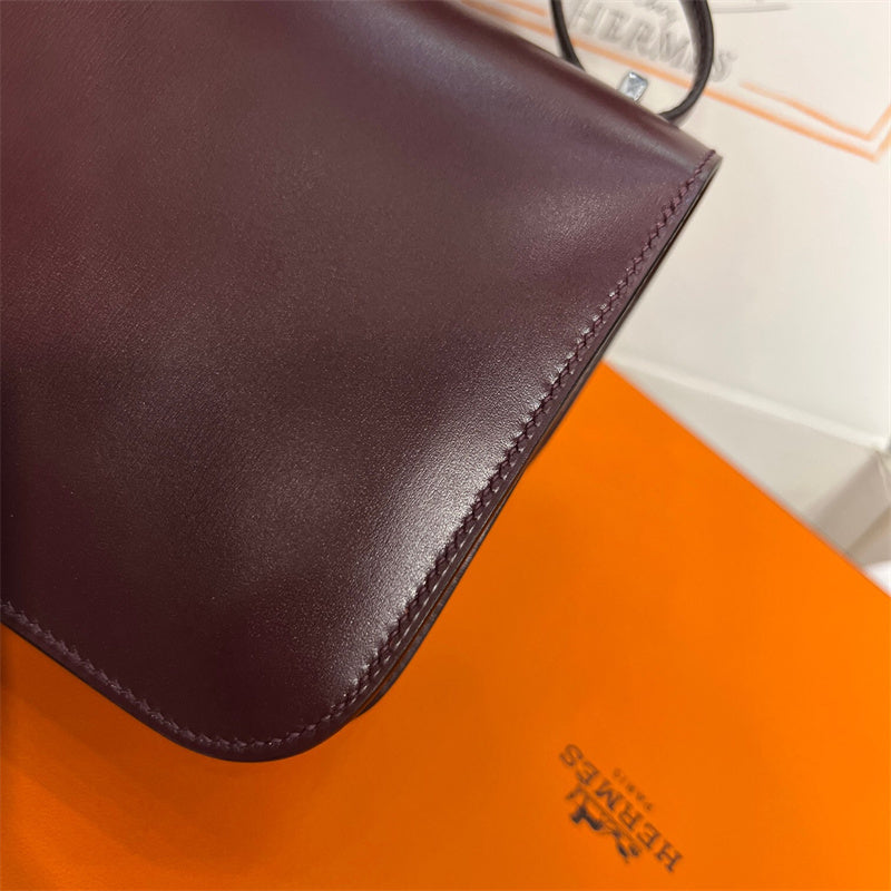 Side view of clean-lined structured handbag