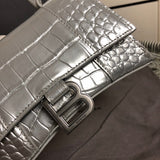 Handle and strap detail of modern classic women's handbag – women's luxury accessory