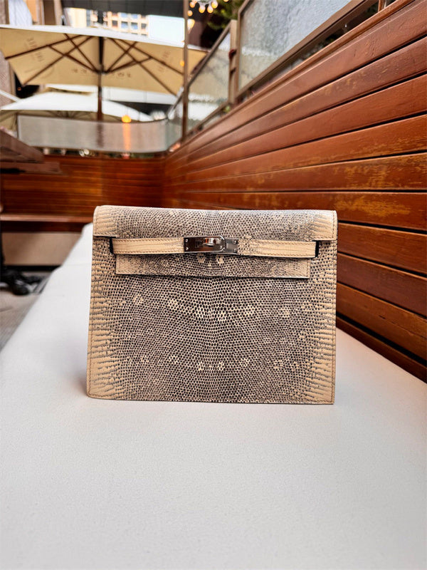 Side view of streamlined structured handbag