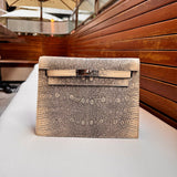 Side view of streamlined structured handbag