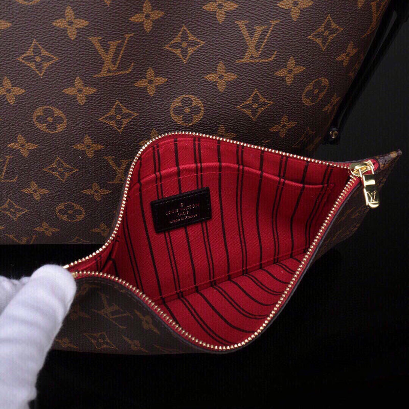 Styled lifestyle shot of everyday-luxe sleek women's handbag – women's luxury accessory