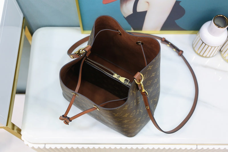 Side profile of refined sleek women's handbag – women's luxury accessory