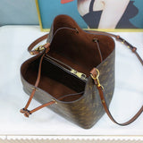Side profile of refined sleek women's handbag – women's luxury accessory